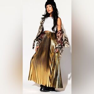 Dressed in Lala Metallic Pleated Midi Skirt in 24 Karat
Gold
